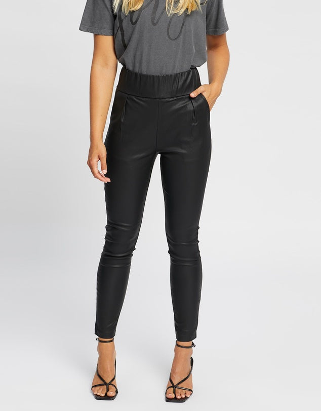 PANT ALEXA JORGE BLACK - Sheen finish leatherette; minimal stretch; unlined; opaque - Ruched elastic waistband; zip-through rear entry - Darted pleats front and rear for tailored look - Two functional slash hip pockets and two rear seamed pockets LADIES DRESS PANTS